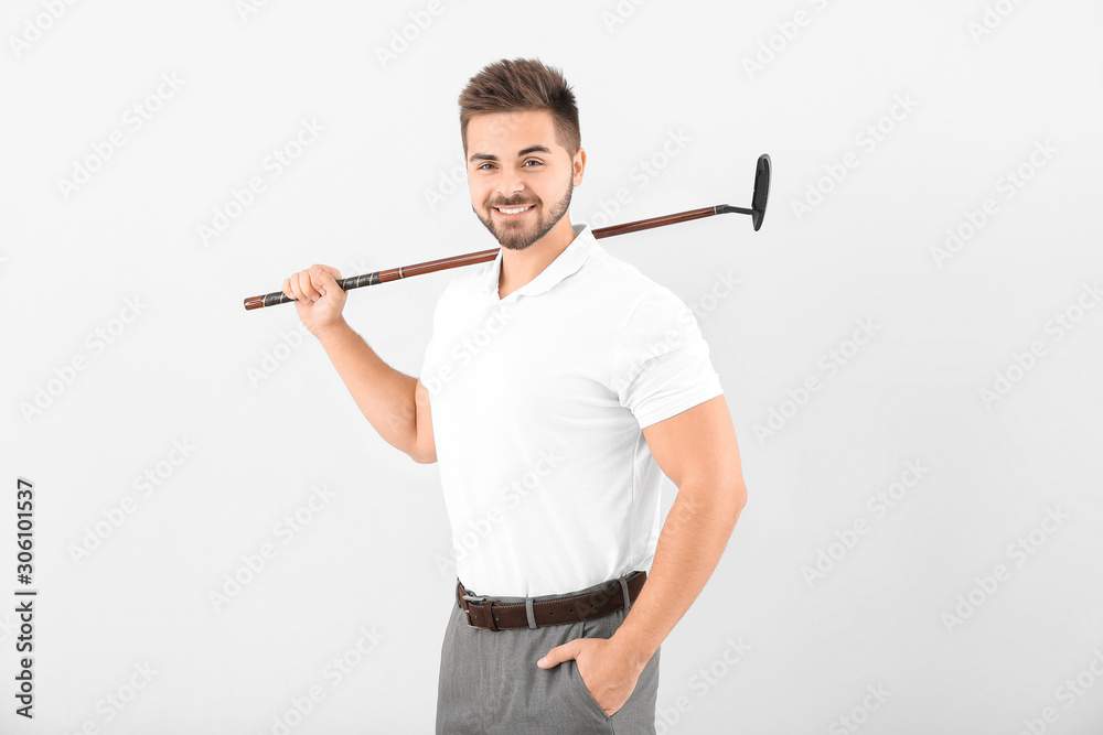 Handsome male golfer on white background Handsome male golfer on white background
