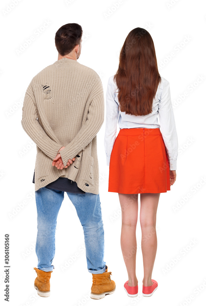 Back view of couple. beautiful friendly girl and guy together. Back view of couple. beautiful friendly girl and guy together.