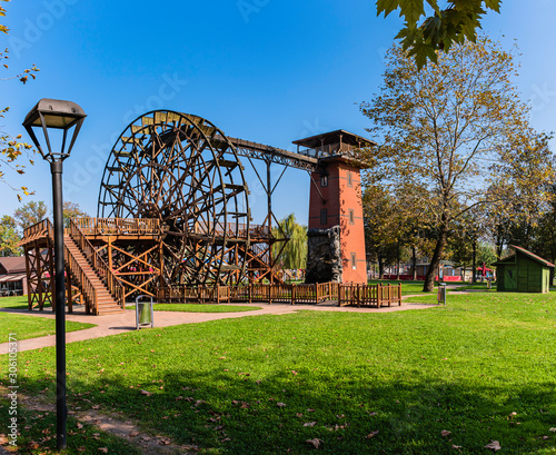 Windmill and water mill among greenery in Sakarya City Square park
