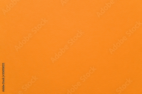Texture of flame orange colored paper for watercolor and pastel. Fashionable pantone color of spring-summer 2020 season from London fashion week. Modern luxury background, mock up with space for text