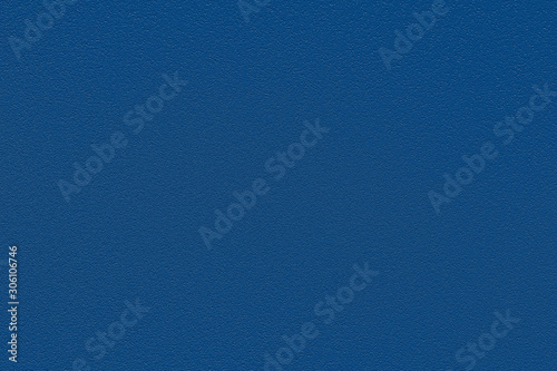 Color of the year 2020. Fashionable classic blue pantone color of spring-summer 2020 season. Texture of colored porous rubber. Modern luxury background or mock up with space for text