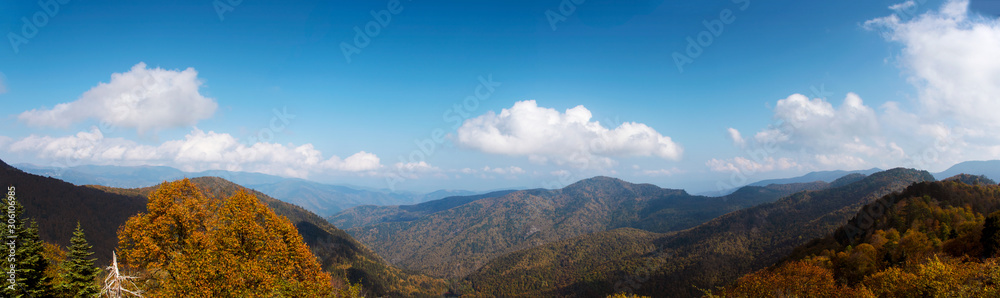 Panoramic view of mountains on Yedigoller Road. Clouds and mountain hills reflect the colors of autumn.