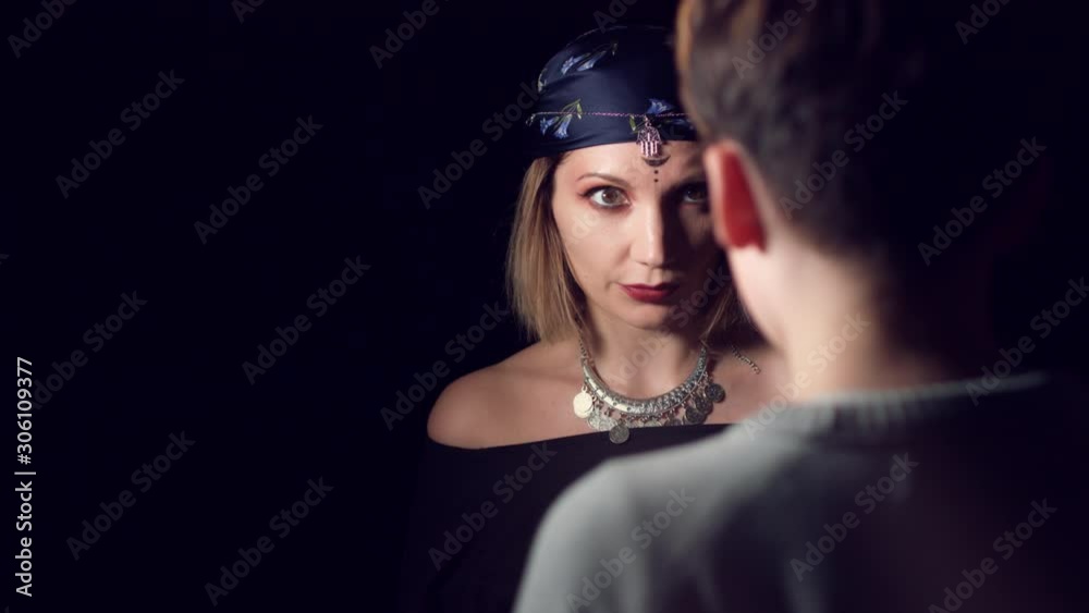 4k Mysterious Shot of Fortune Teller Reading Future for Client 4k Mysterious Shot of Fortune Teller Reading Future for Client