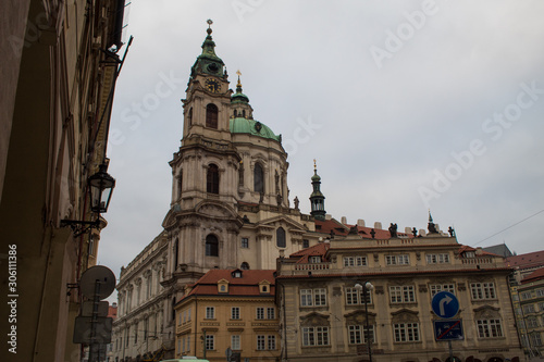 Cityscape of architecture and ancient streets of the Czech capital of Prague early in the morning before Christmas.