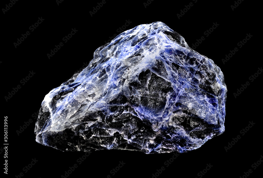 Black and blue sodalite mineral stone specimen on a black background