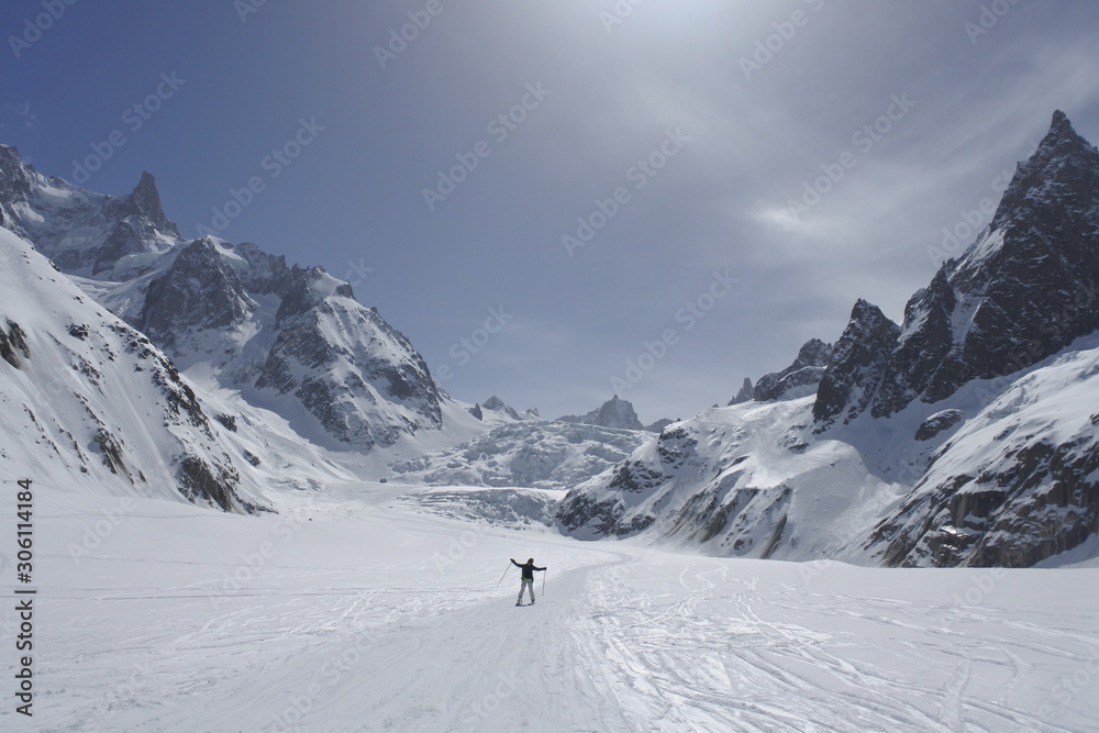 skiers in the mountains