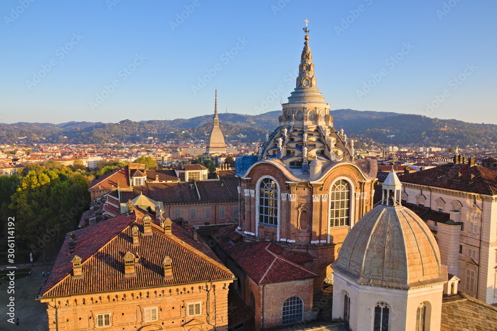 Mole Antonelliana and the Chapel of the Holy Shroud in Turin, Italy, seen from the cathedral bell tower at sunset