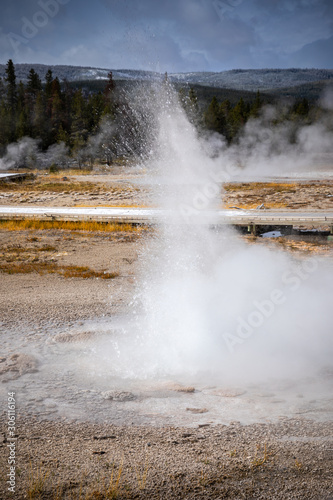 Eruption of small geyser basin in Yellowstone.