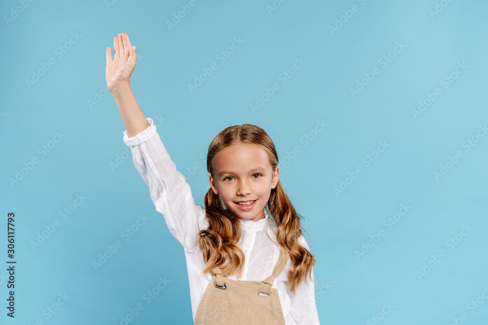 smiling and cute kid with outstretched hand looking at camera isolated on blue smiling and cute kid with outstretched hand looking at camera isolated on blue