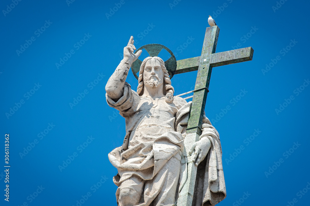 Vatican City - June05 , 2019: Statue of Jesus on the top of Saint Peter Basilica facade - Seagull Vatican City - June05 , 2019: Statue of Jesus on the top of Saint Peter Basilica facade - Seagull
