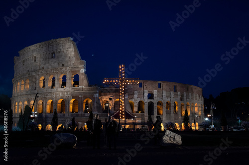 Valokuva Rome - Italy, April 19, 2019: Pope Francis leads the Via Crucis (Way of the Cross) torchlight procession at the Colosseum on Good Friday