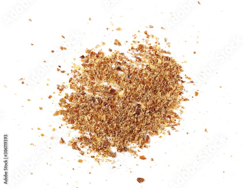 Ground, milled flaxseed, linseed flakes isolated on white background