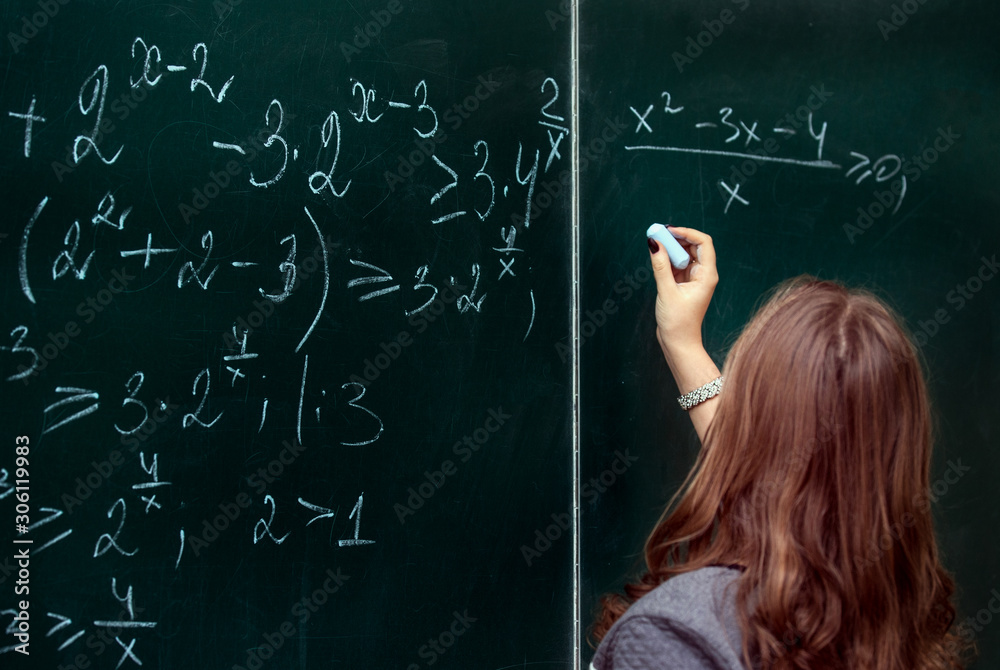 close up of math formulas on a blackboard close up of math formulas on a blackboard