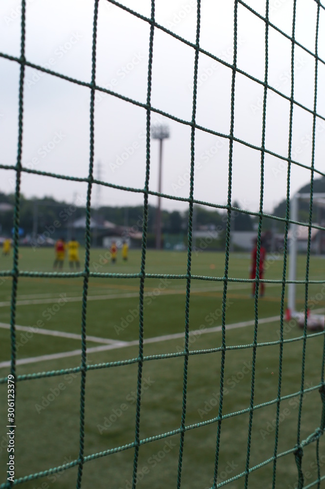 Blurred image, practice scene in a soccer field Blurred image, practice scene in a soccer field
