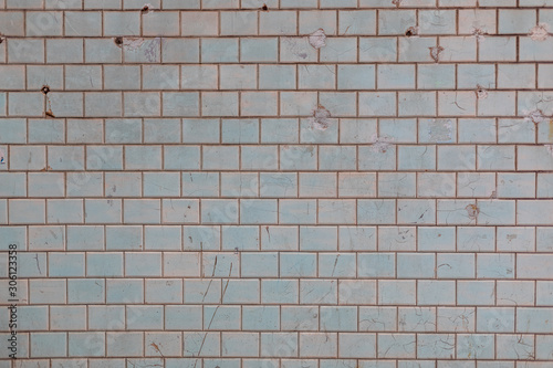 Wall of blue and gray tiles. Background. Photowall-paper. Copy space. Flat lay.