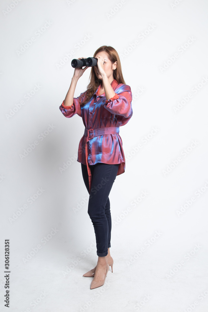 Full body of young Asian woman with binoculars. Full body of young Asian woman with binoculars.