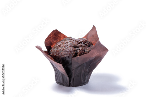 Delicious chocolate muffins isolated on white background.