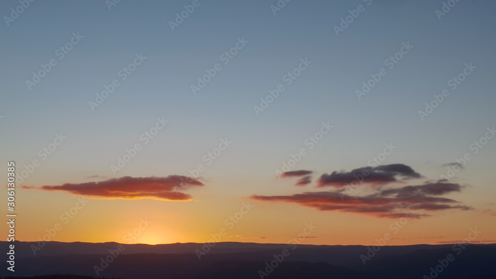 Beautiful clouds with sunset over the Megalong Valley NSW Australia from the Blue Mountains