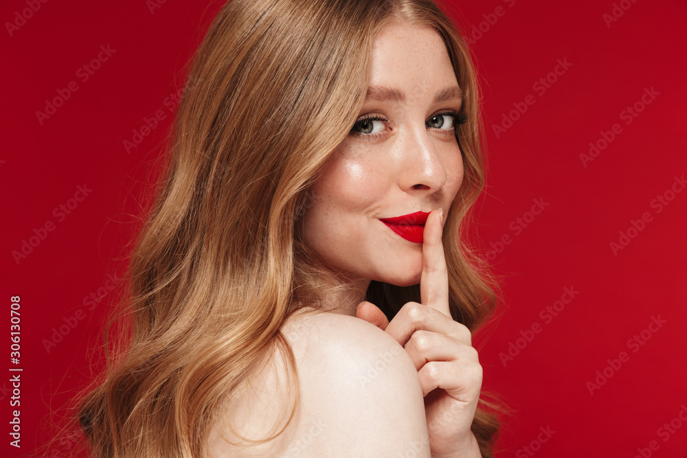 Caucasian woman posing isolated showing silence gesture. Caucasian woman posing isolated showing silence gesture.