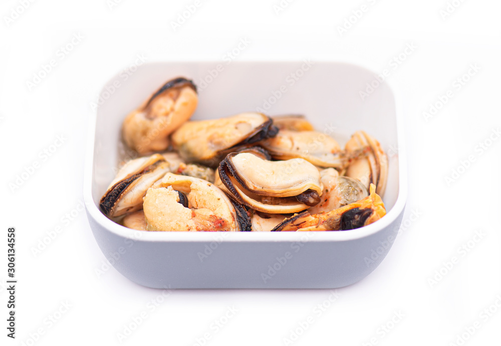 Plate or Bowl with Mussels in Oil, Mussels marinated with Oil isolated on white Background Plate or Bowl with Mussels in Oil, Mussels marinated with Oil isolated on white Background