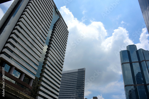 Image of building and condo building at blue sky background