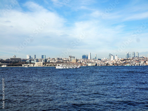 view of city through sea with ferry in Istanbul Turkey © Tatiana  Nikitina