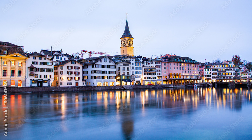 scenic view of historic Zurich city center with famous Fraumunster and Grossmunster Churches and river Limmat at Lake Zurich, Canton of Zurich, Switzerland scenic view of historic Zurich city center with famous Fraumunster and Grossmunster Churches and river Limmat at Lake Zurich, Canton of Zurich, Switzerland