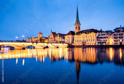 scenic view of historic Zurich city center with famous Fraumunster and Grossmunster Churches and river Limmat at Lake Zurich, Canton of Zurich, Switzerland