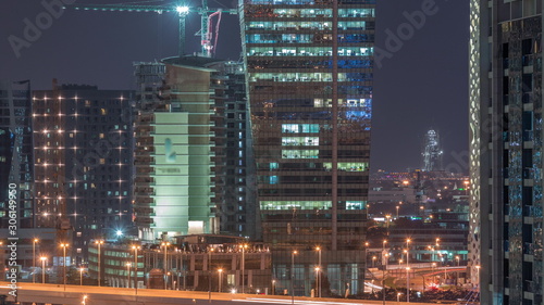 Beautiful lights in Dubai with constructing aerial timelapse