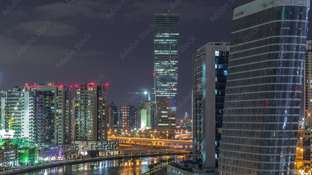 The rhythm of the city of Dubai near canal aerial timelapse The rhythm of the city of Dubai near canal aerial timelapse