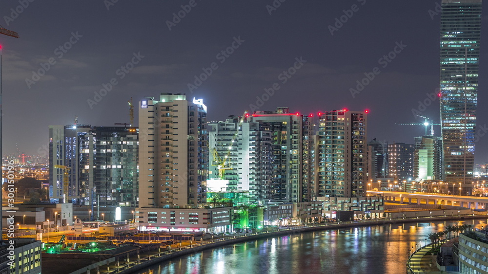 The rhythm of the city of Dubai near canal aerial timelapse