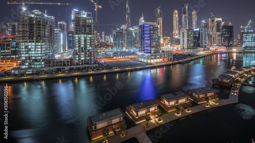 The rhythm of the city of Dubai near canal aerial timelapse