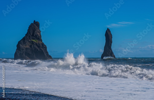 Reynisfjara Beach, Vik Village, Sudurland, Iceland, Europe. Amazing landscape with basalt rock formations and Troll Toes on Black beach Reynisfjara. September 2019