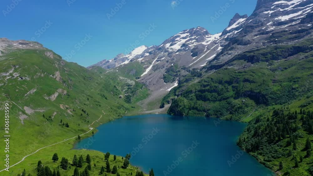 The turquoise blue water of the Swiss lakes - wonderful nature of Switzerland - aerial photography The turquoise blue water of the Swiss lakes - wonderful nature of Switzerland - aerial photography