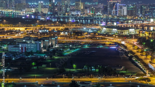 View of new modern buildings at nighttime in luxury Dubai city, United Arab Emirates Timelapse Aerial © neiezhmakov