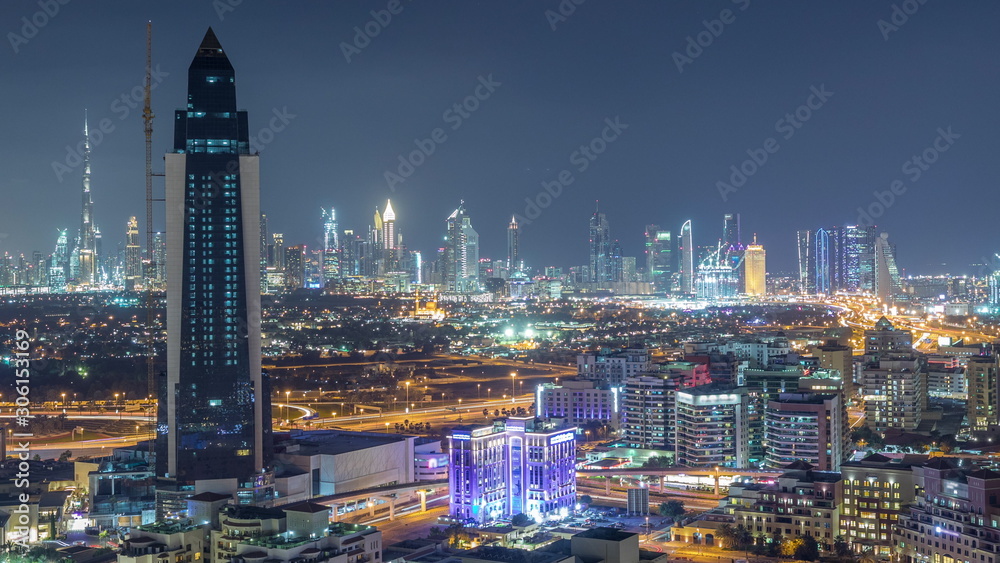 Nighttime view of lights in luxury Dubai city, United Arab Emirates Timelapse Aerial