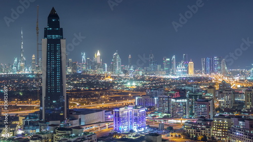 Nighttime view of lights in luxury Dubai city  United Arab Emirates Timelapse Aerial