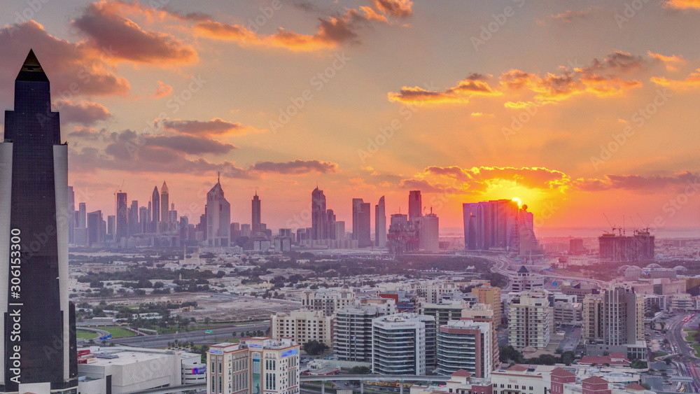 View of sunset in luxury Dubai city at sunset aerial timelapse