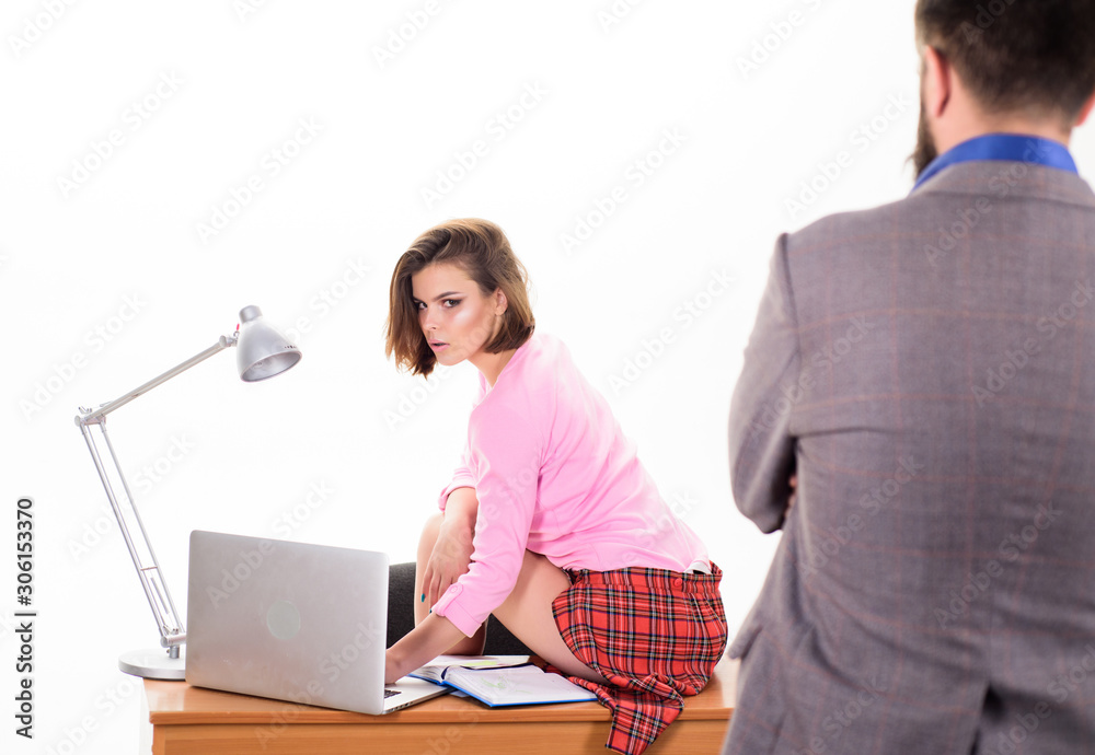 Office manager or secretary. Sexy personal secretary. Full of desire.  Sexual fantasy. Sexy lady worker. Ready for inspection. Sexual tension. Man  boss stand in front of sexy girl working laptop foto de