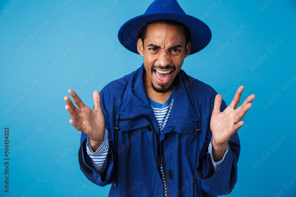 Photo of african american man screaming with throwing up hands Photo of african american man screaming with throwing up hands