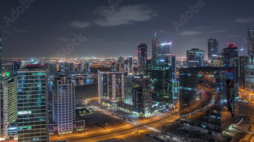 Dubai's business bay towers aerial night timelapse.