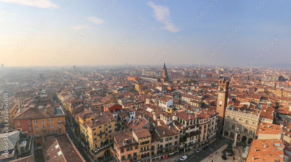 Roofs of houses and towers of the Italian old city from the observation deck. Verona, Italy