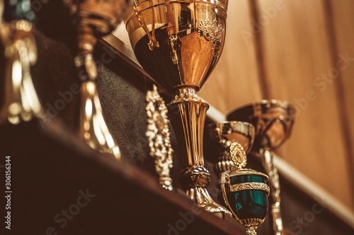 Sports cups and medals for awarding athletes at the championship prizes for winning
