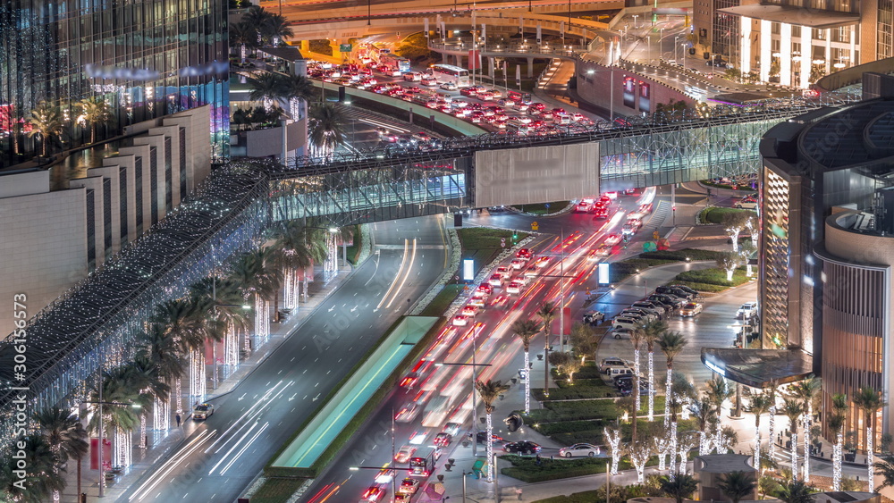 View of intersection with many transports in traffic night Timelapse Aerial