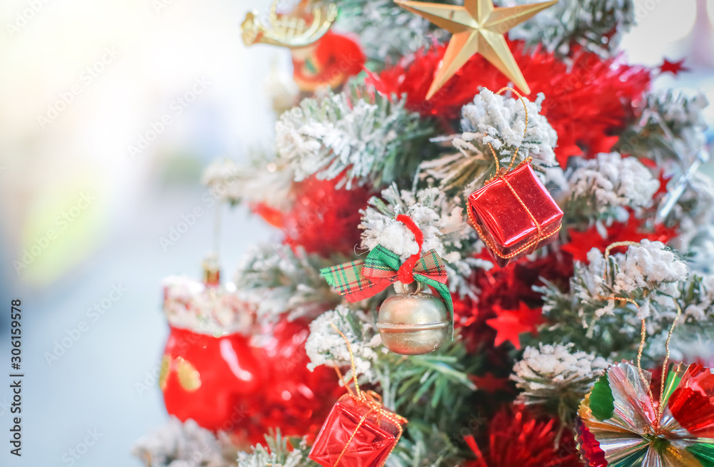 Blurry of Christmas and New Year's balls with beautiful decorations on the Christmas tree, soft light, beautiful background images and illustrations. Blurry of Christmas and New Year's balls with beautiful decorations on the Christmas tree, soft light, beautiful background images and illustrations.