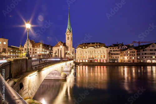 scenic view of historic Zurich city center with famous Fraumunster and Grossmunster Churches and river Limmat at Lake Zurich, Canton of Zurich, Switzerland
