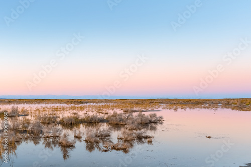 saline and alkaline land in sunset