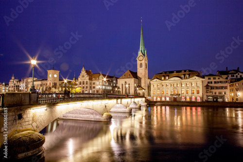 scenic view of historic Zurich city center with famous Fraumunster and Grossmunster Churches and river Limmat at Lake Zurich, Canton of Zurich, Switzerland