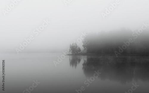 misty lake in the morning.