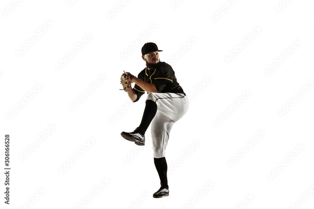 Baseball player, pitcher in a black uniform practicing and training isolated on a white background. Young professional sportsman in action and motion. Healthy lifestyle, sport, movement concept. Baseball player, pitcher in a black uniform practicing and training isolated on a white background. Young professional sportsman in action and motion. Healthy lifestyle, sport, movement concept.